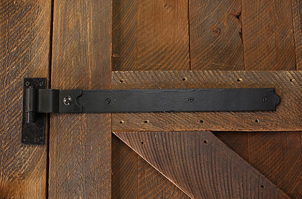 Black Hinge on Wood Door